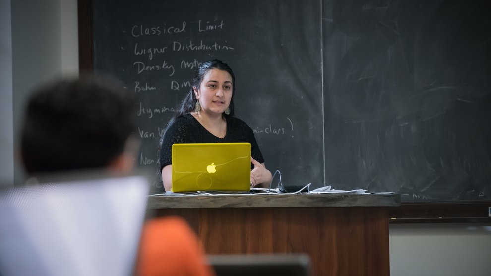A grad student gives a lecture.