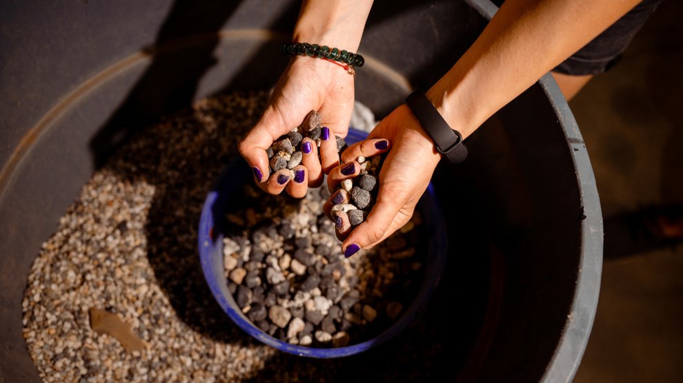 Various rocks in a students' hand.