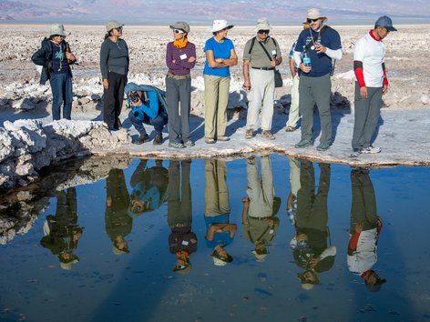 Group of people standing on the Chilean salt flats