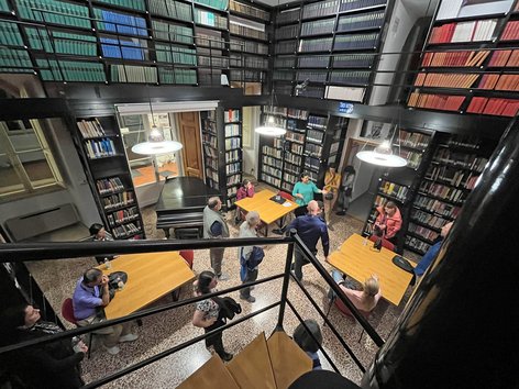 Photo of tourists in a library