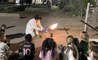 Chemistry club demonstrating a flame test