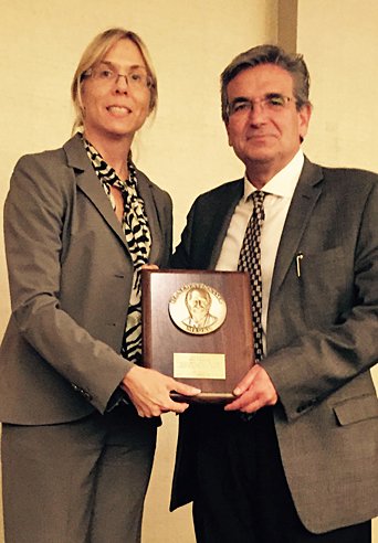 Professor Rosakis receiving the Sia Nemat-Nasser Medal