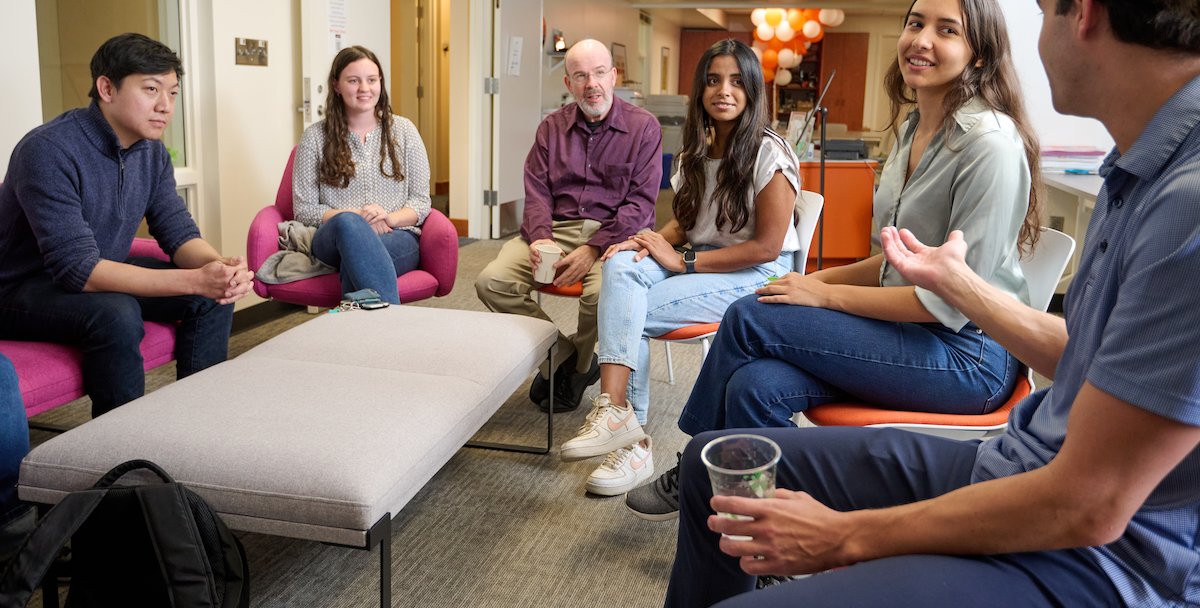 Mentors and students gather on campus