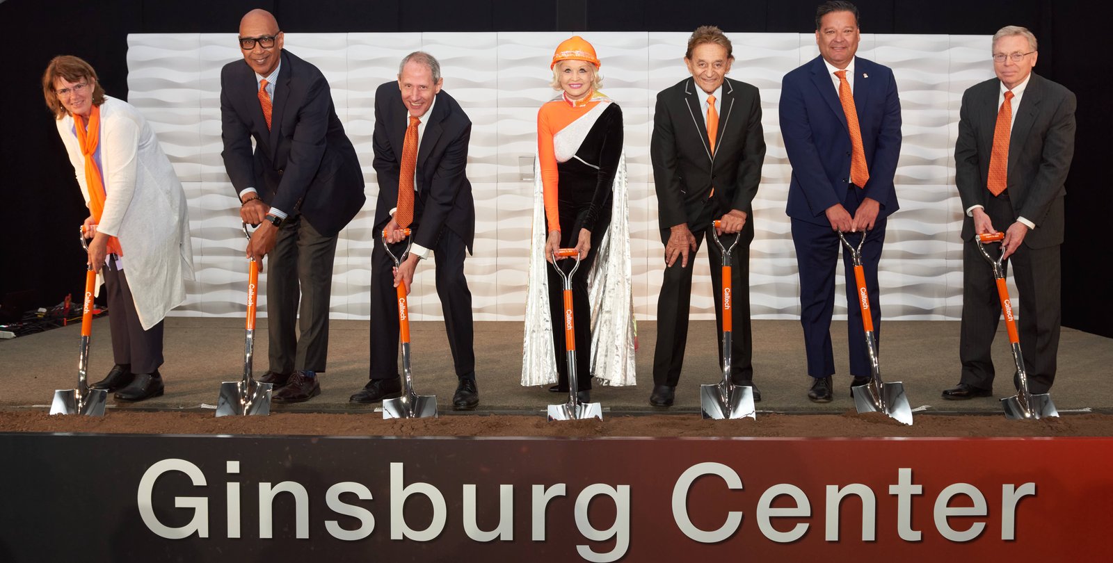 The groundbreaking of the Ginsburg Center with guests holding shovels.