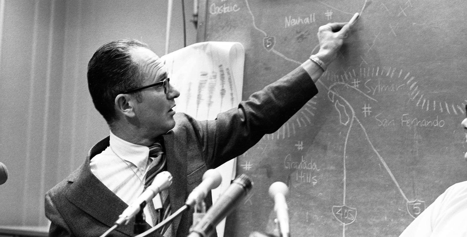 Clarence Allen answers questions about the San Fernando Earthquake during a press conference at the Seismological Laboratory on February 10, 1971.