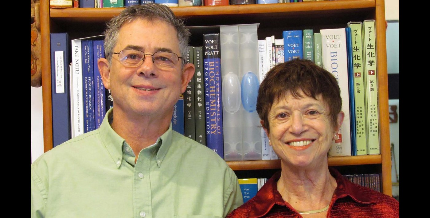 Donal and Judy in front of bookshelf