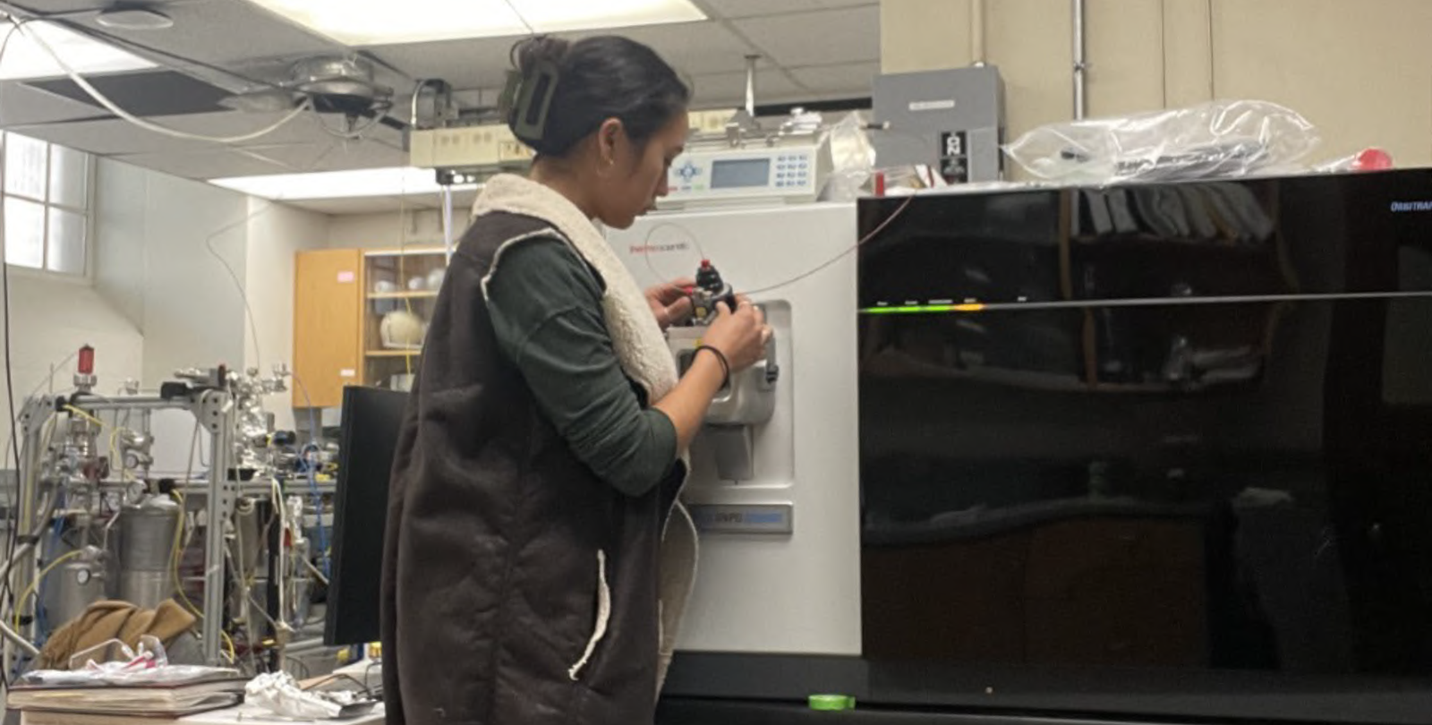 Graduate student Sarah Zeichner uses the redesigned orbitrap mass spectrometer developed in the laboratory of John Eiler.