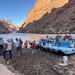Group loads materials onto a river raft