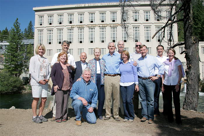 John and Louise Bryson (center, he in khakis and she in jeans) with several of his colleagues and their spouses at the John E. Bryson Powerhouse in Big Creek, California, renamed for John on his retirement