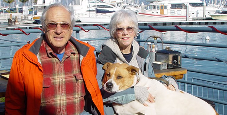 Michael Konrad, Wanda deVlaminck, and their dog, Darwin