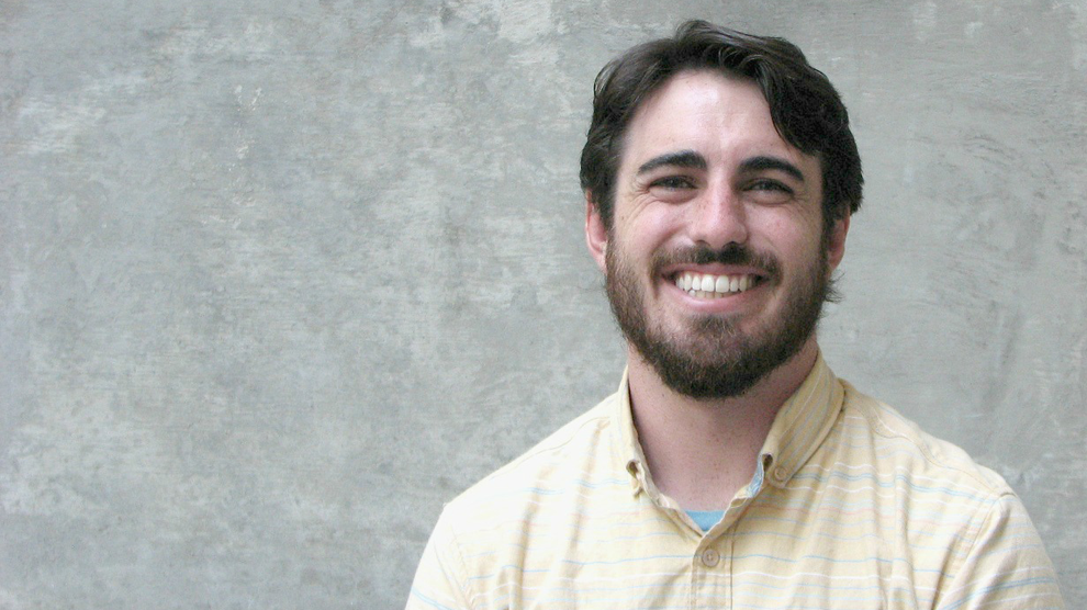 Keith Pluymers smiles.