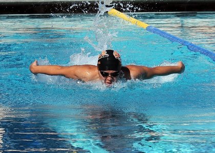 swimmer in lap pool facing camera