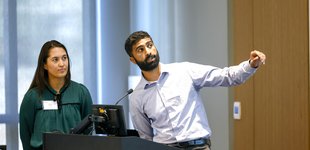 First place winners CAD.it present their pitch to the judges.