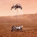 The rover, now descended from the sky crane, rests on the Martian surface. The rocket-powered backpack hovers above.