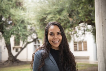 Portrait of person in front of trees