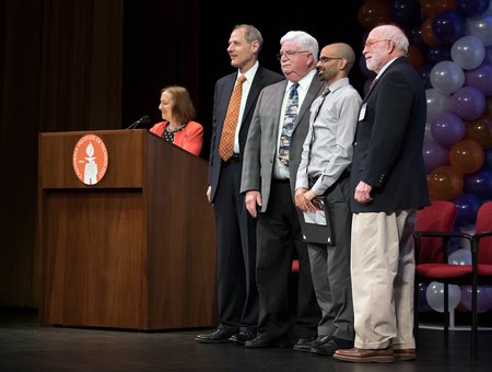 Staff honorees on stage