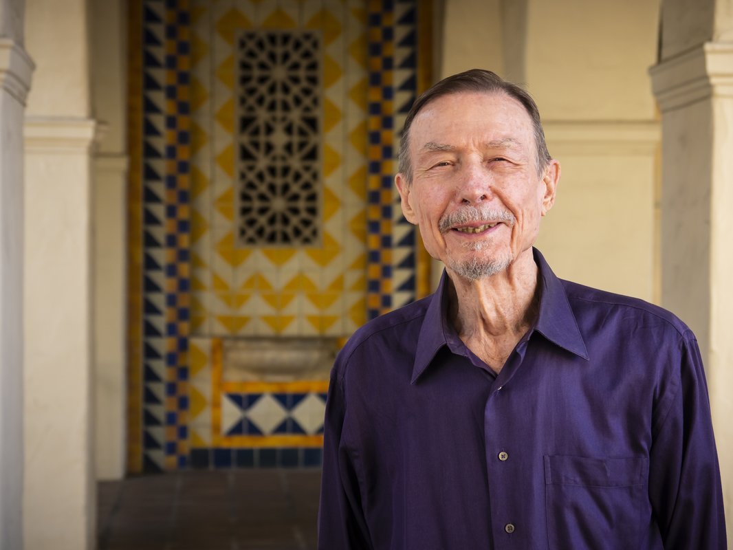 image of carver mead wearing a purple button down shirt