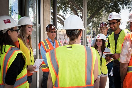 COUCH committee members tour the Bechtel Residence building site.