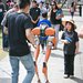 Science for March participant Stella Cook stops to watch a demonstration of Caltech's bipedal robot Cassie at the March 31 event. 