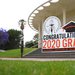 A sign in front of Beckman Auditorium offers congratulations to the Class of 2020.