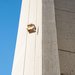 An egg falls from the top of Caltech Hall inside a protective cardboard shell.