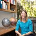 Image of Bethany Ehlmann in office wearing blue shirt.