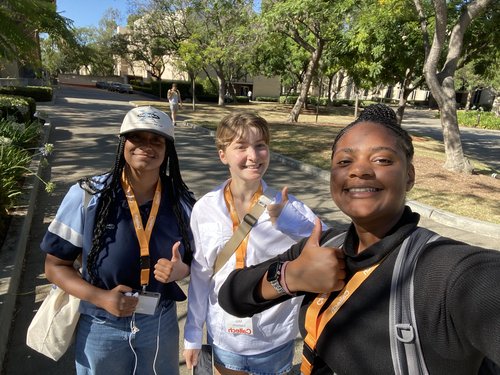 Adoniya Paul, far right, poses with friends at WiSTEM 2023.