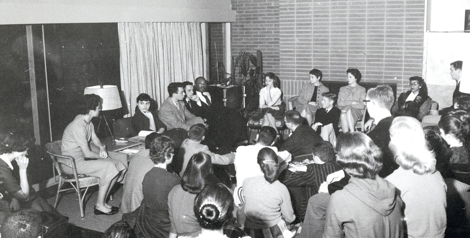 Martin Luther King, Jr. meeting with a group of students at Caltech in 1958.