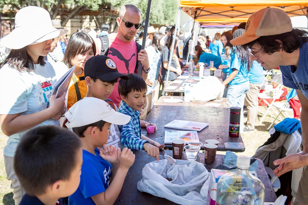 A group of children take part in an interactive science demonstration at the Science for March event.