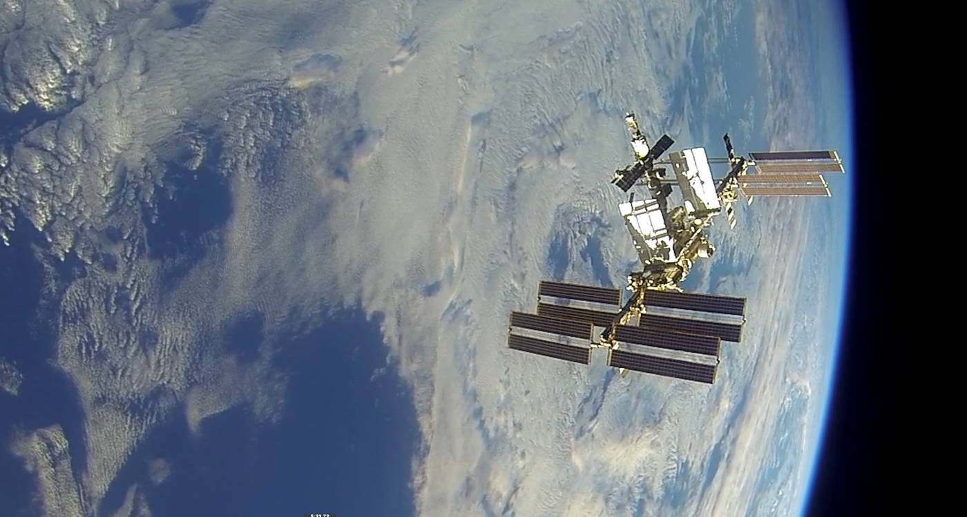 The International Space Station floats in front of the earth