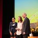 Kelli Blake (center), head coach of men's and women's cross country and track and field, accepts her ASCIT Staff Appreciation Award.