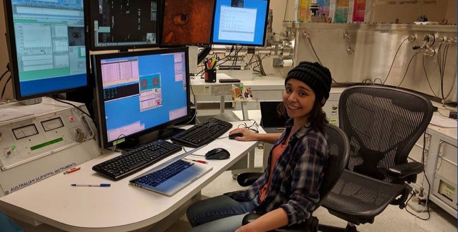 Graduate student Emma Sosa sits works at a computer at Caltech