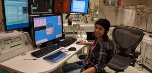 Graduate student Emma Sosa sits works at a computer at Caltech