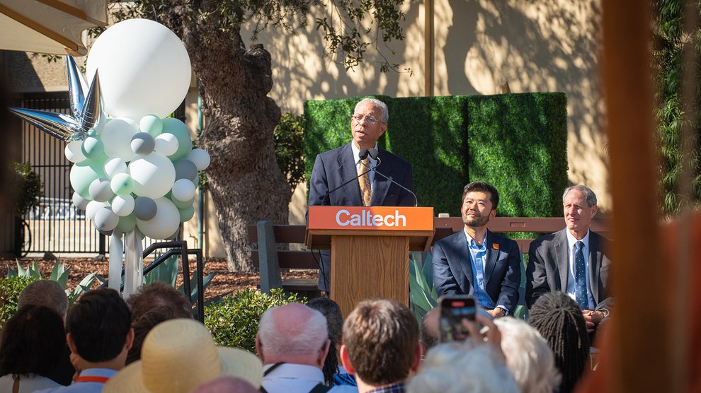 Grant D. Venerable II stands behind a podium that says Caltech