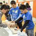 Students check their vehicle in the Battery Buggy event