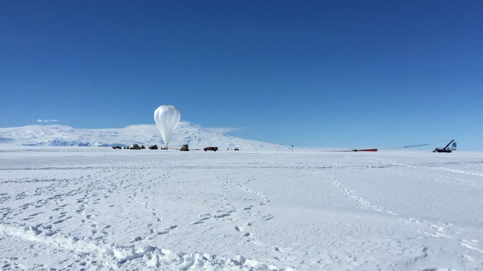 SPIDER and its balloon in the distance; snow in the foreground